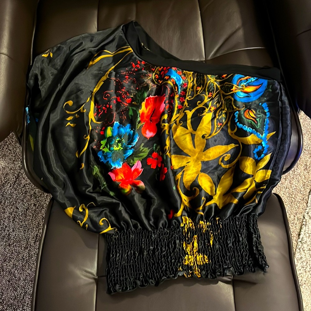 Dressy shirt. Size Large one side is sleeveless